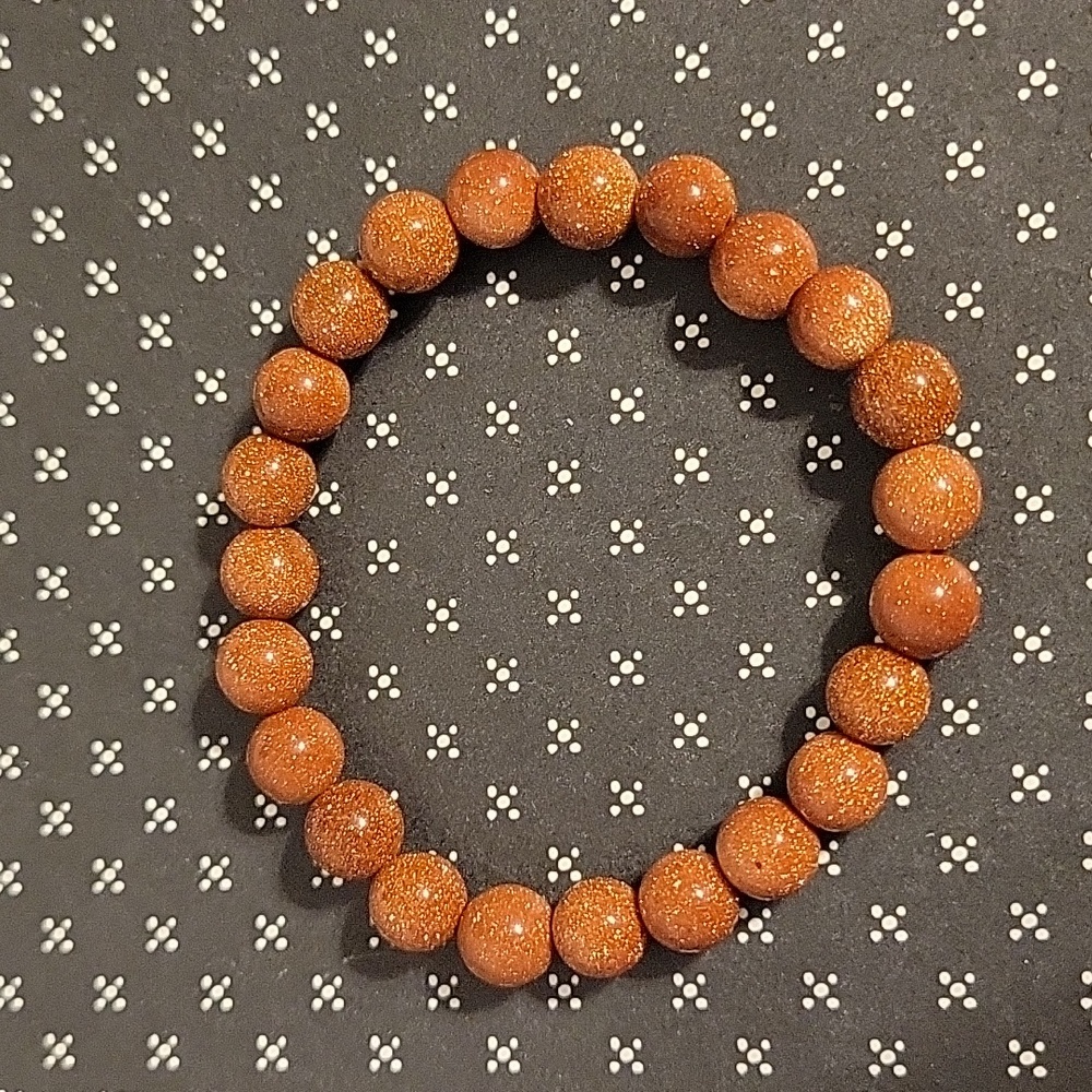 Orange red Goldstone crystal bead 8mm bracelet